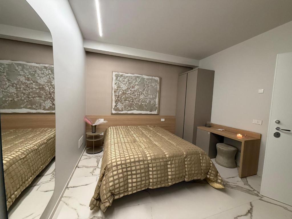 Ένα ή περισσότερα κρεβάτια σε δωμάτιο στο Porta Bari Rooms