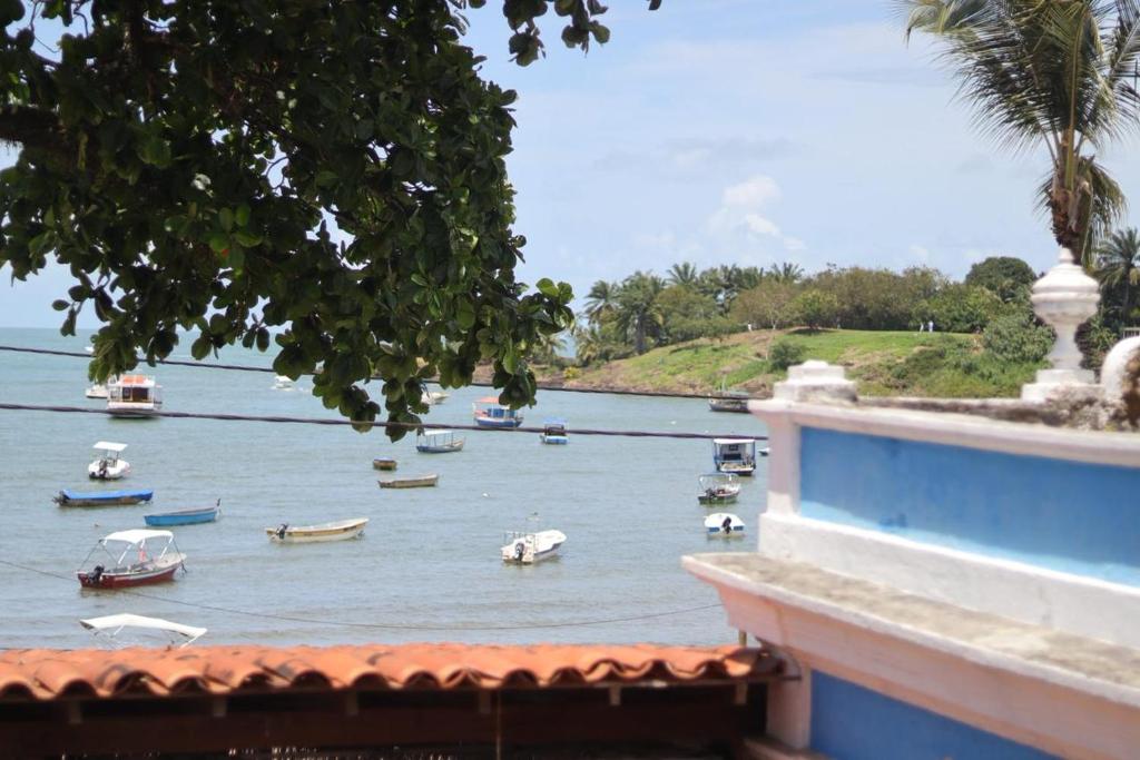 a view of a river with boats in the water at Hostel IndiaJara in Itacaré