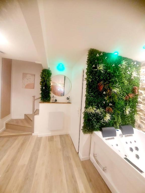 Love Room chic et intime idéale pour un séjour à deux avec jacuzzi et balcon