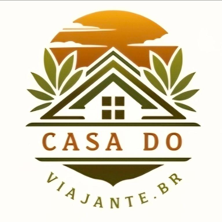 a logo for a real estate company with a house at Casa do ViajanteBr in Barreirinhas