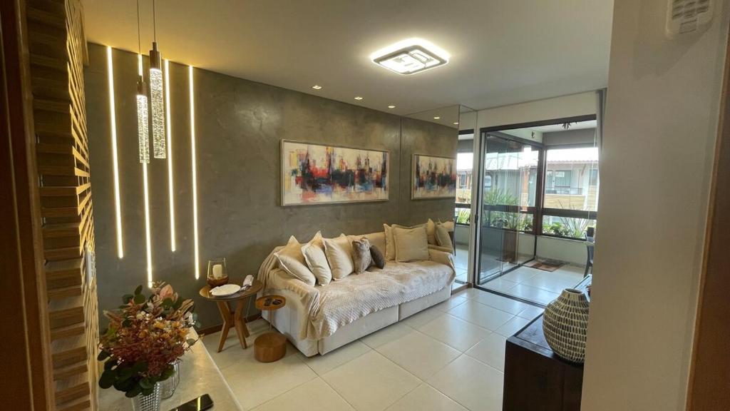 Ένα ή περισσότερα κρεβάτια σε δωμάτιο στο Village Bioflora Residential Itacimirim