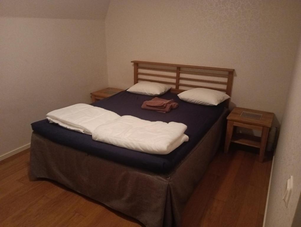 Ένα ή περισσότερα κρεβάτια σε δωμάτιο στο Lugnt läge för 1-4