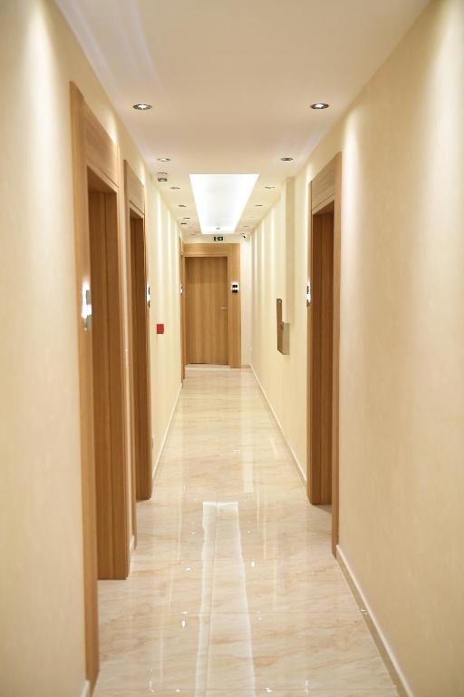 a hallway of a building with a long corridor at Argument rooms in Belgrade