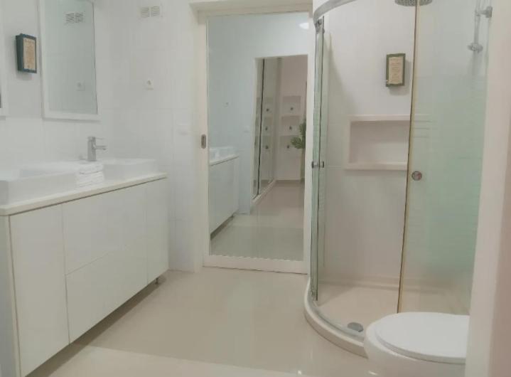 Et badeværelse på Four Palms Boutique Hotel