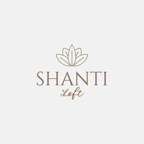 a logo for a tea company with a lotus flower at Shanti Loft B in San Juan