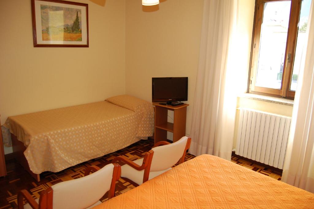 TV a/nebo společenská místnost v ubytování Hotel Delle Alpi