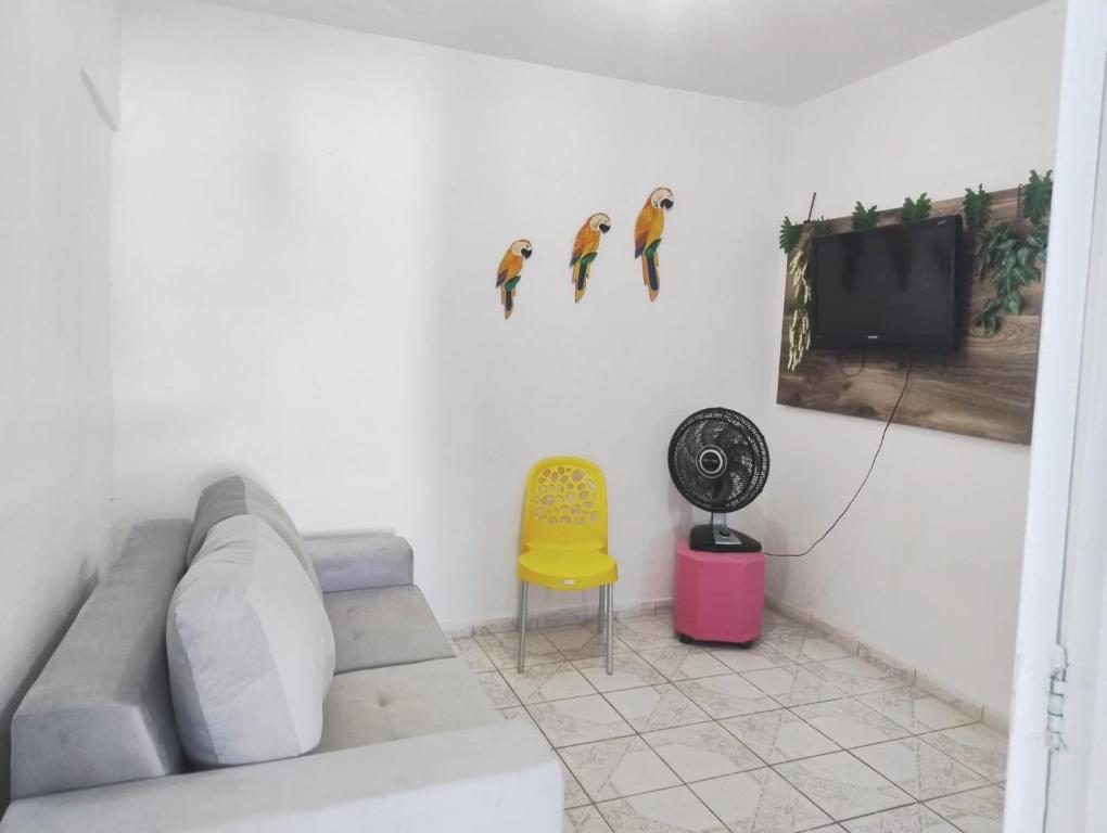 TV a/nebo společenská místnost v ubytování Casa completa em Olinda