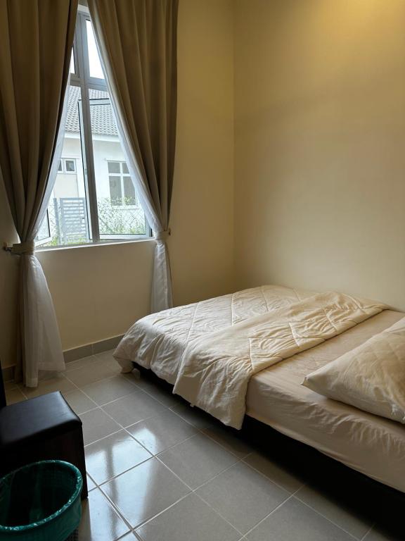 Ένα ή περισσότερα κρεβάτια σε δωμάτιο στο NHI Home Paka