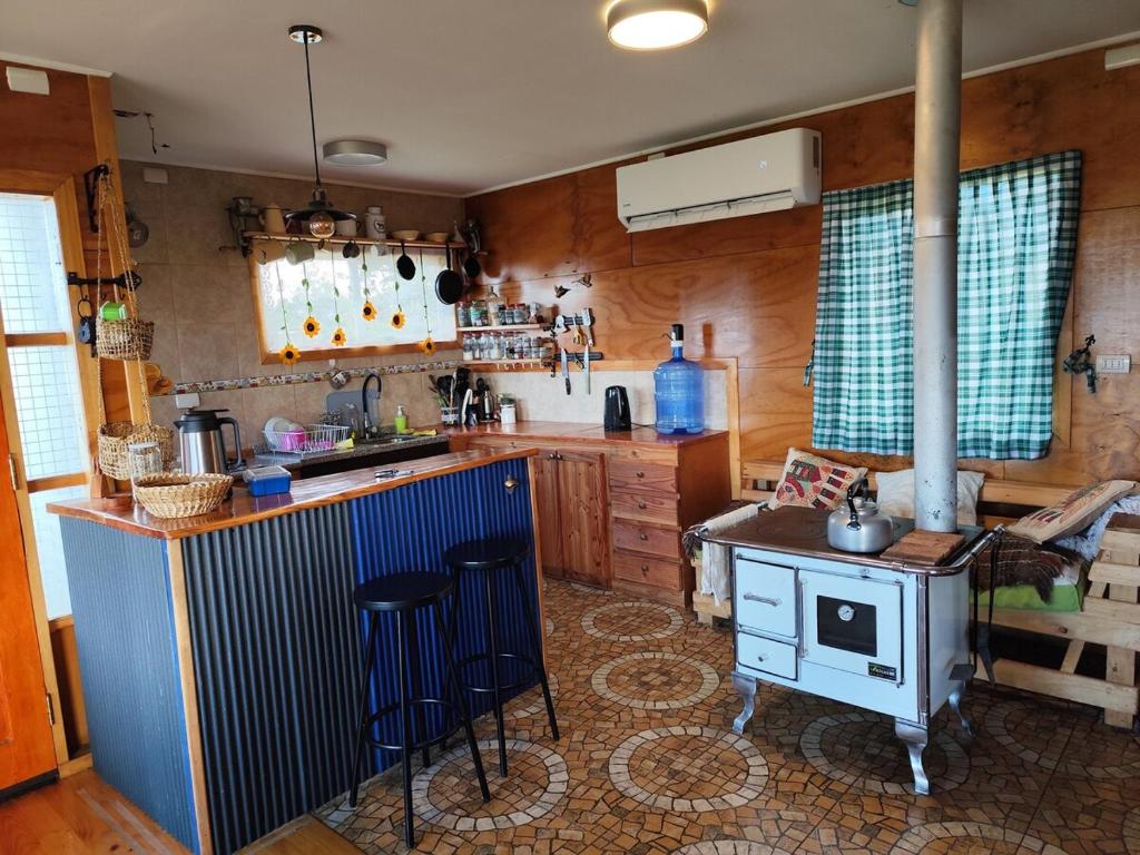 Η κουζίνα ή μικρή κουζίνα στο Waiwén Casa Chilota