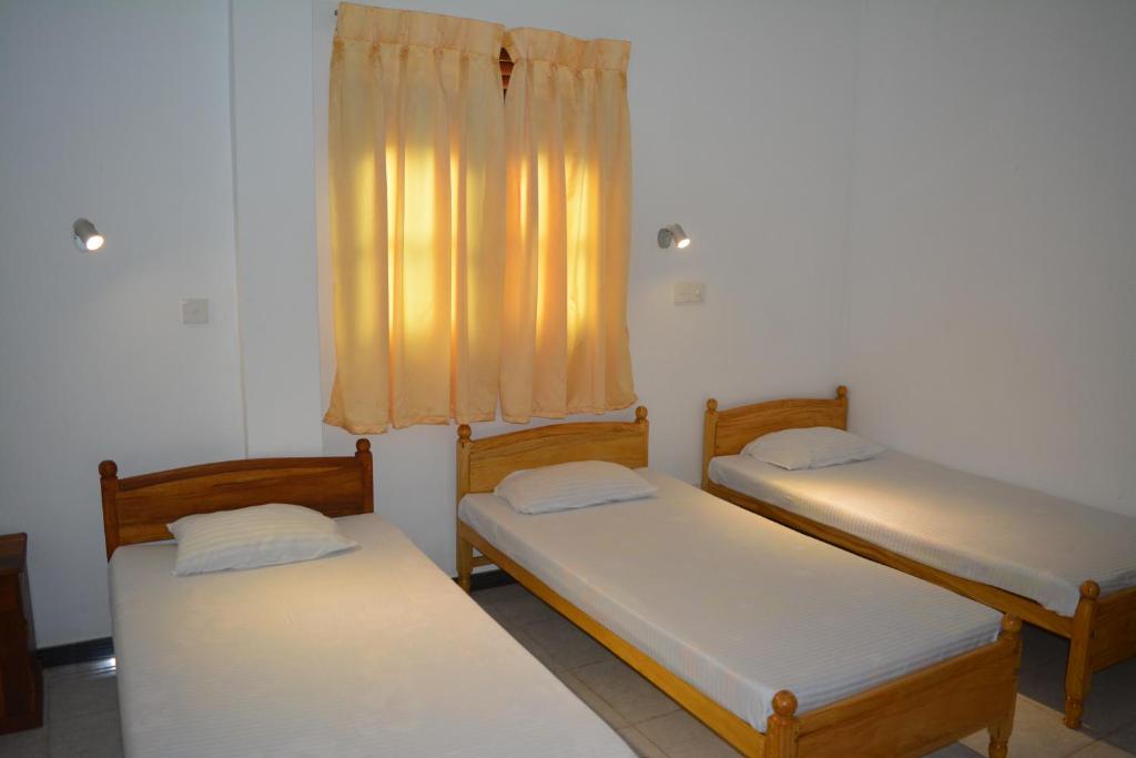 Postel nebo postele na pokoji v ubytování Shining Line