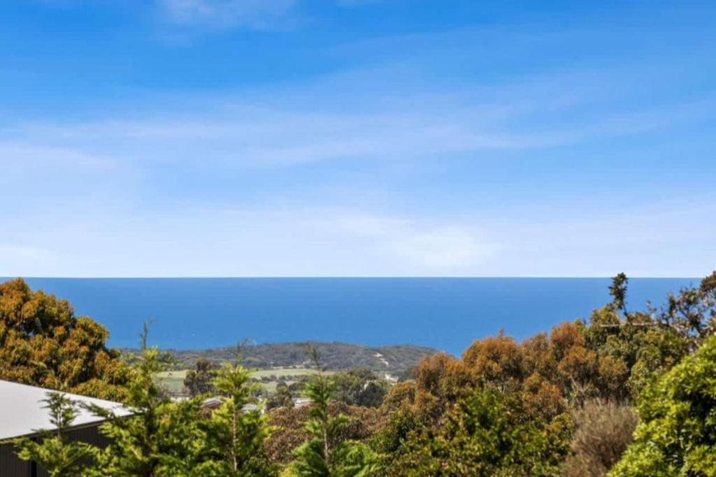 a view of the mountains and trees from a house at Ocean Vista Escape Jan Juc in Bellbrae