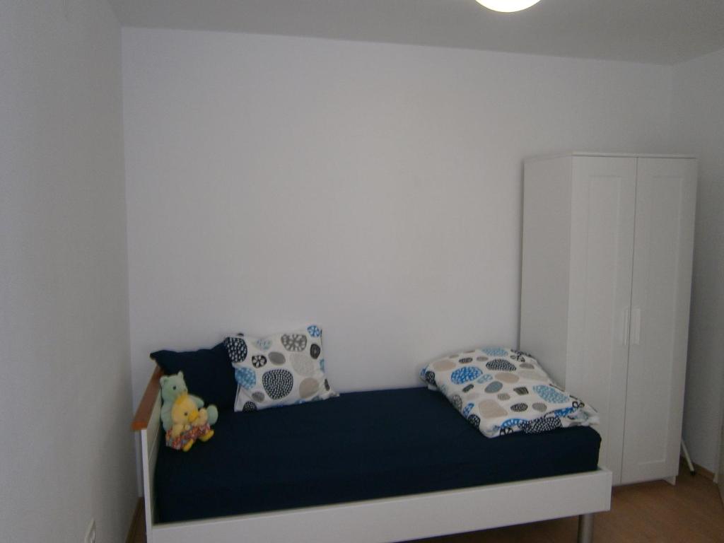 Posteľ alebo postele v izbe v ubytovaní Apartments An Ni