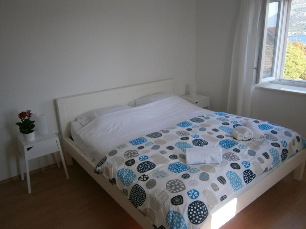Posteľ alebo postele v izbe v ubytovaní Apartments An Ni