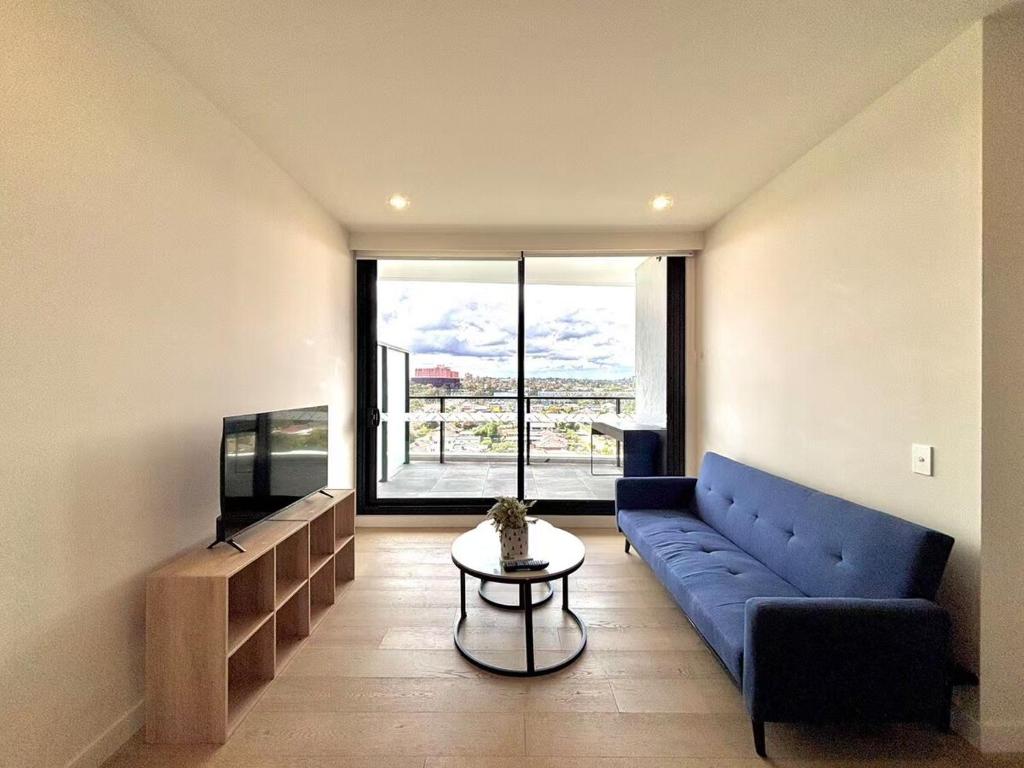 Телевизор и/или развлекательный центр в M-City Comfort Den near Monash & Hospital