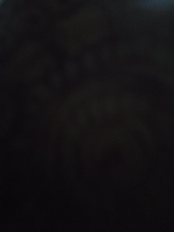 a plane flying through the sky at night at Fcfcf in Cochabamba