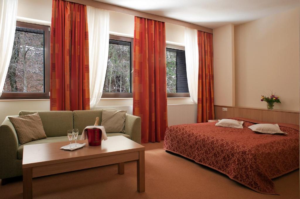 Postel nebo postele na pokoji v ubytování Hotel Stupka