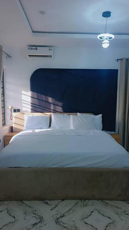 Postel nebo postele na pokoji v ubytování Precious Service Apartment Home