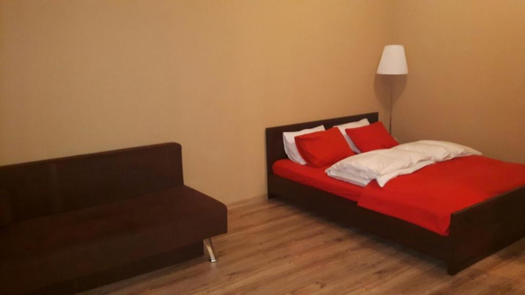 Posteľ alebo postele v izbe v ubytovaní Mini Apartamenty Dominika
