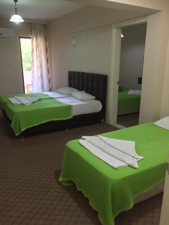 Postel nebo postele na pokoji v ubytování Anatolia Hotel