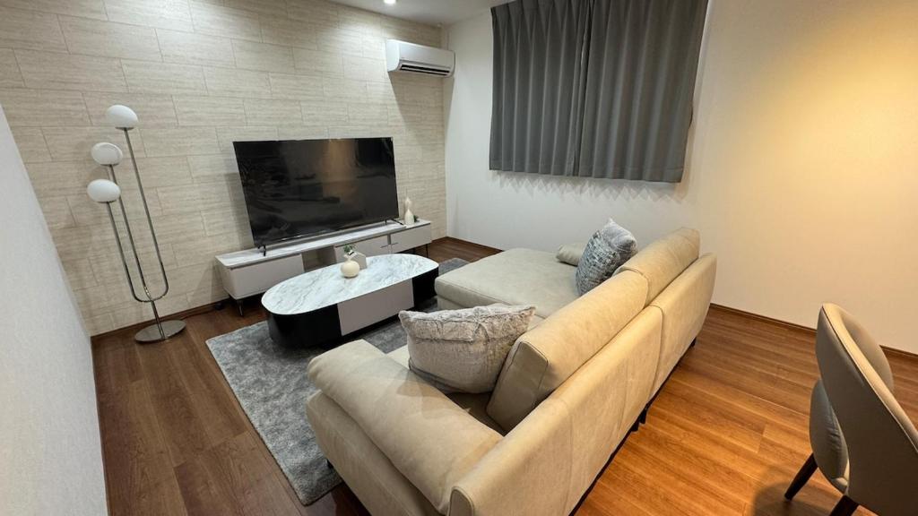 TV a/nebo společenská místnost v ubytování 81886大津町国際交流会館2f宿泊