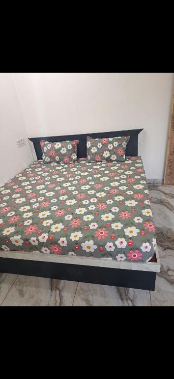 Ένα ή περισσότερα κρεβάτια σε δωμάτιο στο Jay mahadev