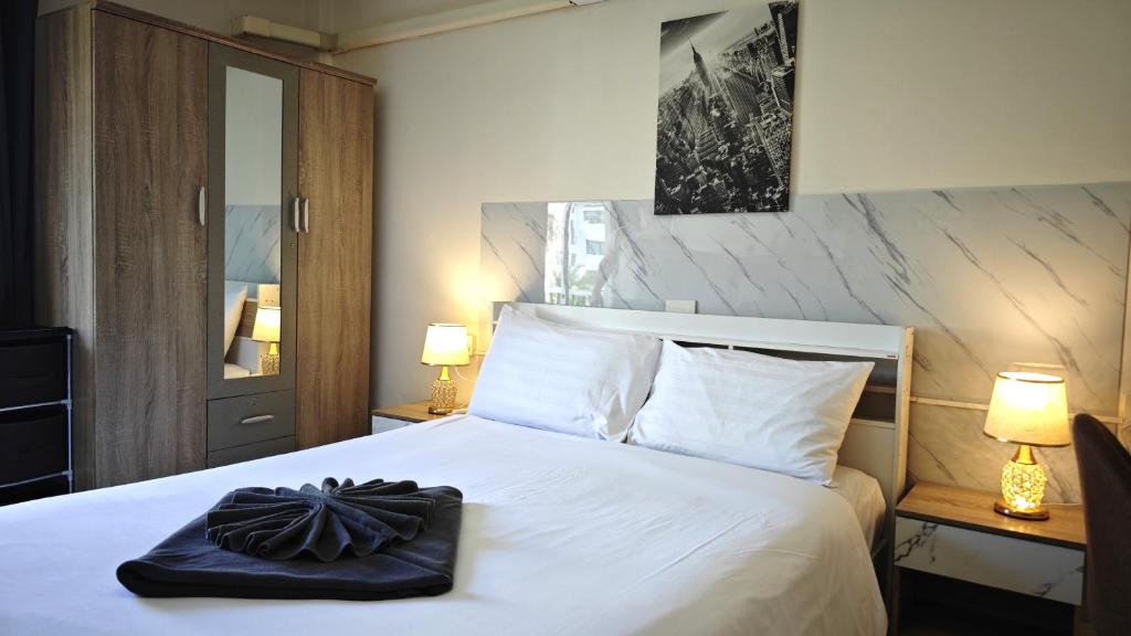 Giường trong phòng chung tại Apartments Kata Beach view garden