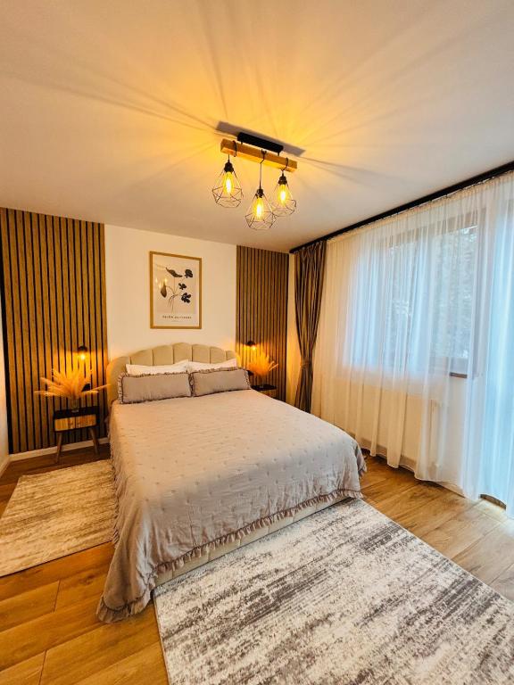 Postel nebo postele na pokoji v ubytování Cozy Home