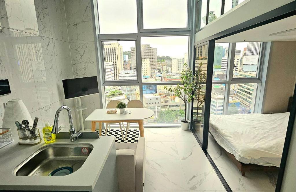 Postel nebo postele na pokoji v ubytování Brill Urban Homes