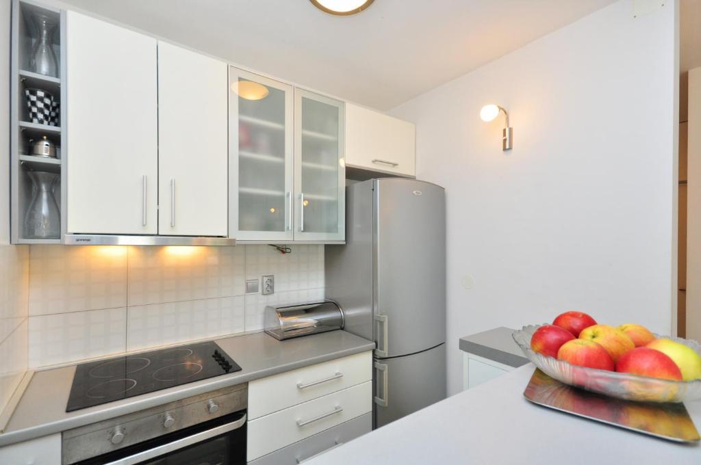 Kuchyň nebo kuchyňský kout v ubytování Apartment Ivan