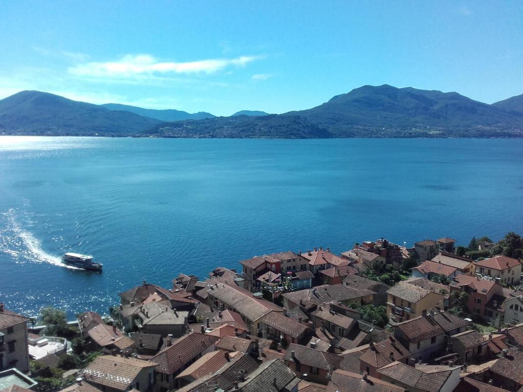 an aerial view of a town on a large body of water at Appartamento Wow in Cannero Riviera