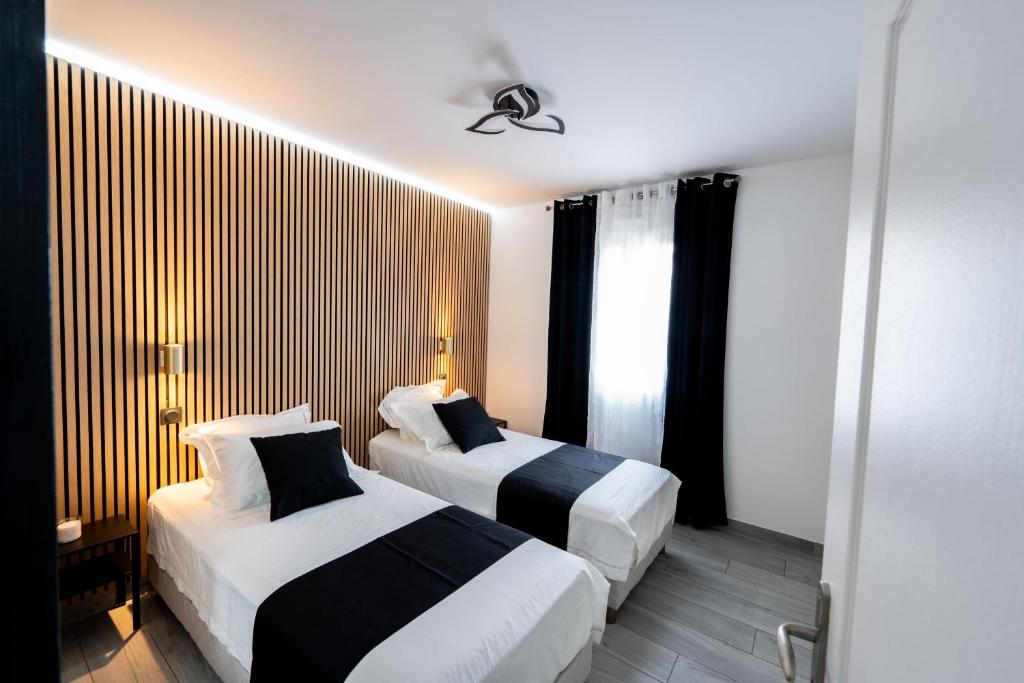 Ένα ή περισσότερα κρεβάτια σε δωμάτιο στο Séjour Professionnel Premium Confort, Fibre & Spa