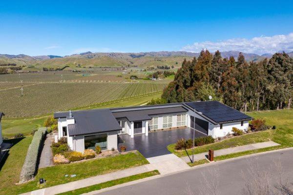 an aerial view of a house in a field at Fairhall view 
