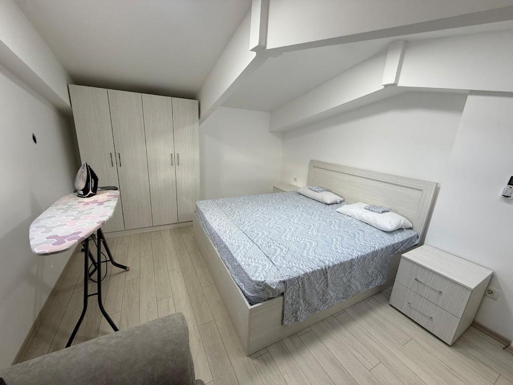 Giường trong phòng chung tại S Apartments A1