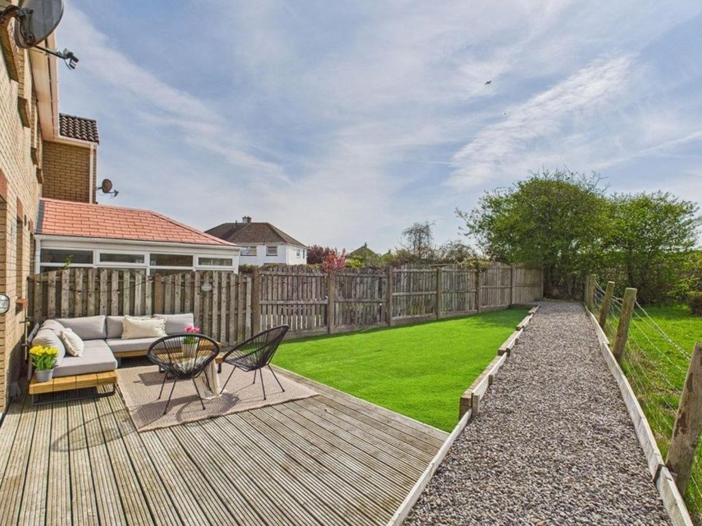 Κήπος έξω από το The Haven Holiday Home