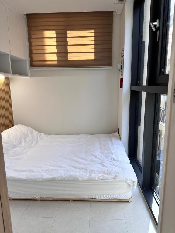 Ένα ή περισσότερα κρεβάτια σε δωμάτιο στο Lemonbutter home