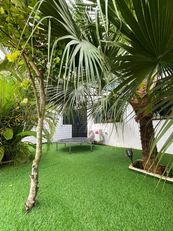 Κήπος έξω από το Appartement de luxe avec piscine