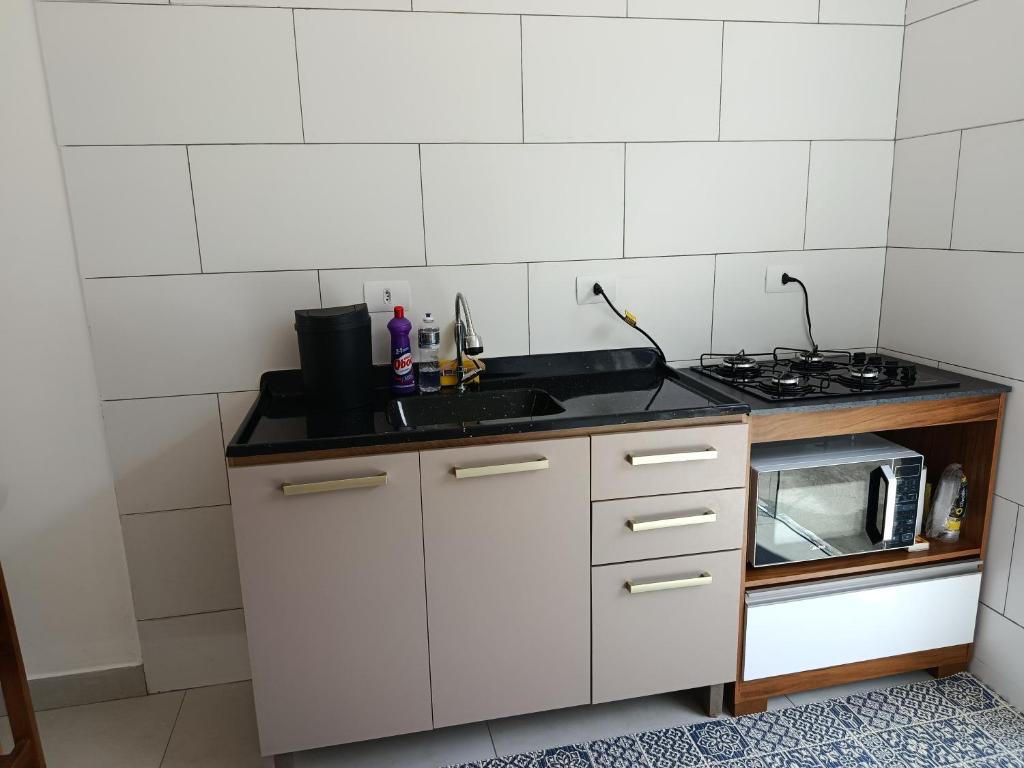 Køkken eller tekøkken på Casa recém inaugurada, em condomínio, a 750 m do mar