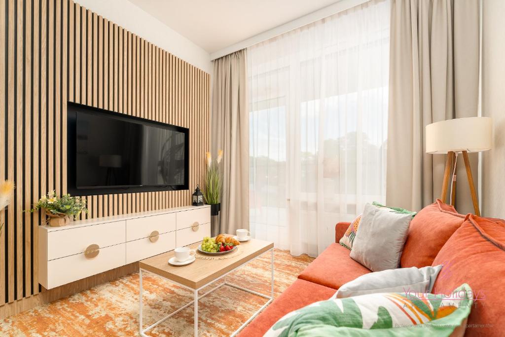 Телевизор и/или развлекательный центр в Your Holidays Bel Mare Aqua 537F