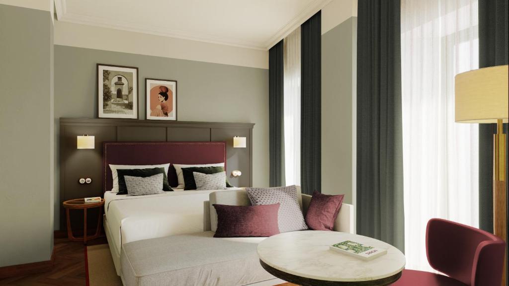 Ένα ή περισσότερα κρεβάτια σε δωμάτιο στο Honest Hotel Granada