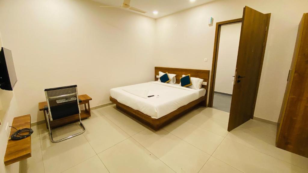 Ένα ή περισσότερα κρεβάτια σε δωμάτιο στο Hotel O The Classic Crown