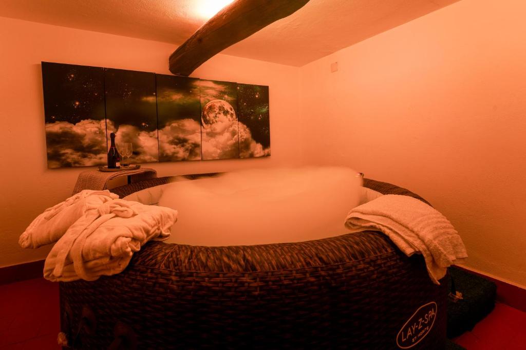 Ένα ή περισσότερα κρεβάτια σε δωμάτιο στο Romantic Nest