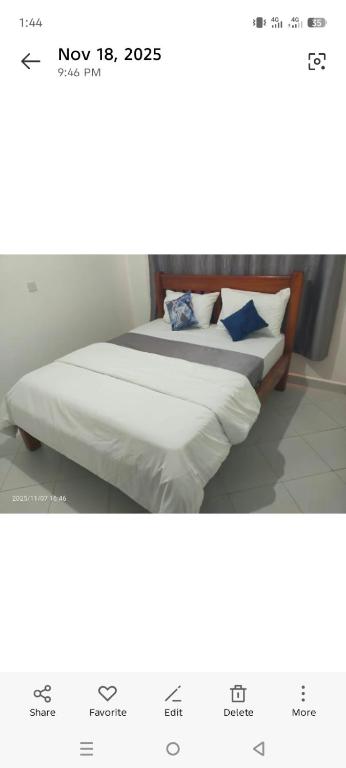 Ένα ή περισσότερα κρεβάτια σε δωμάτιο στο Rusinga Hub