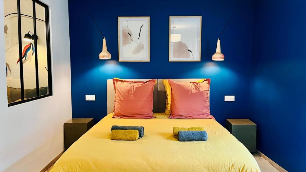 En eller flere senge i et værelse på Le Triplex Chic & Choc - Disneyland Paris