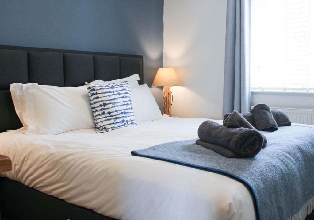 Postel nebo postele na pokoji v ubytování The Moorings