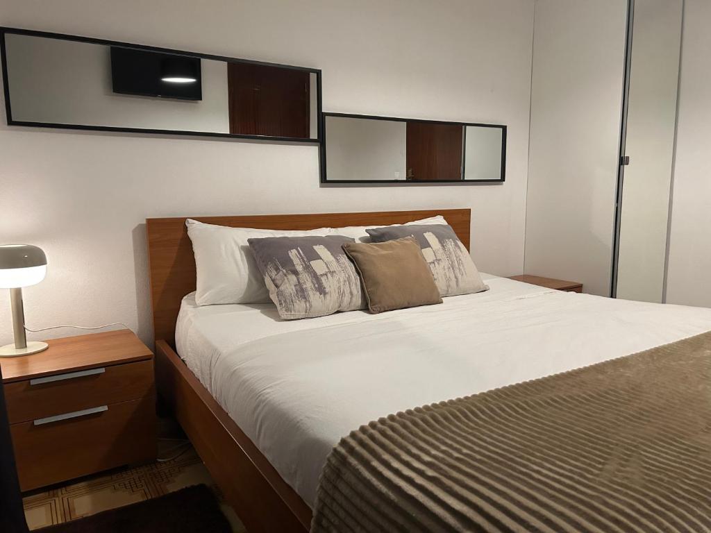 Postel nebo postele na pokoji v ubytování Minho AL