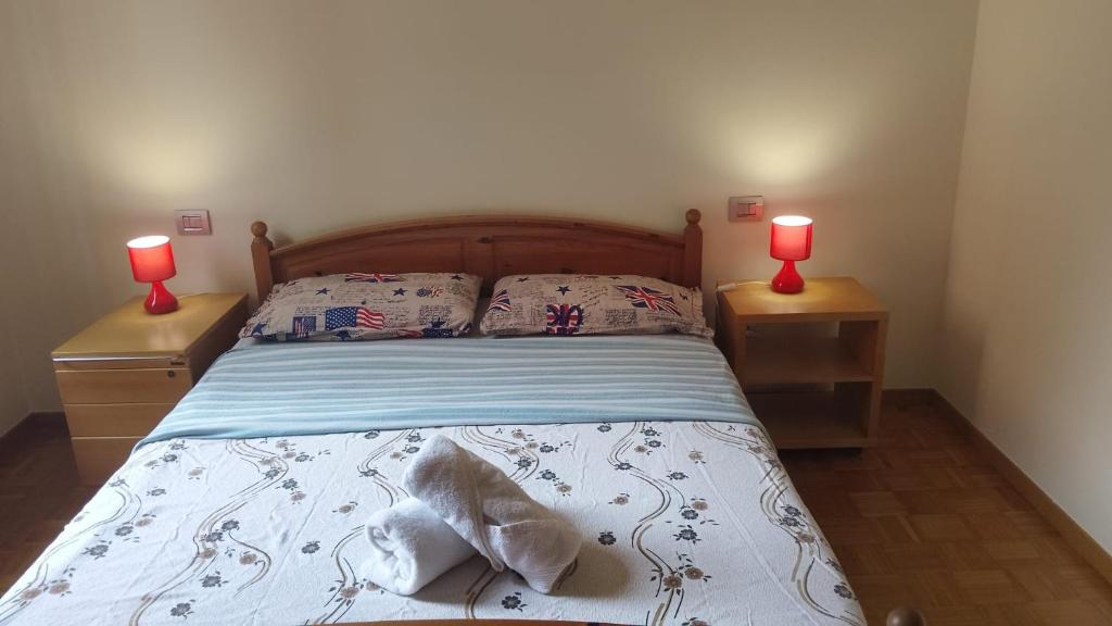 Ένα ή περισσότερα κρεβάτια σε δωμάτιο στο QUEEN HOME S GIOVANNI ideal for families or large group