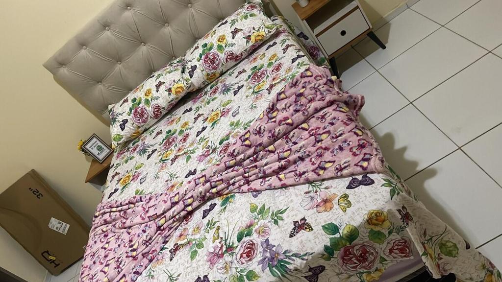 Een bed of bedden in een kamer bij Casa Cariri Mobiliada com 2 Quartos e 2 Camas