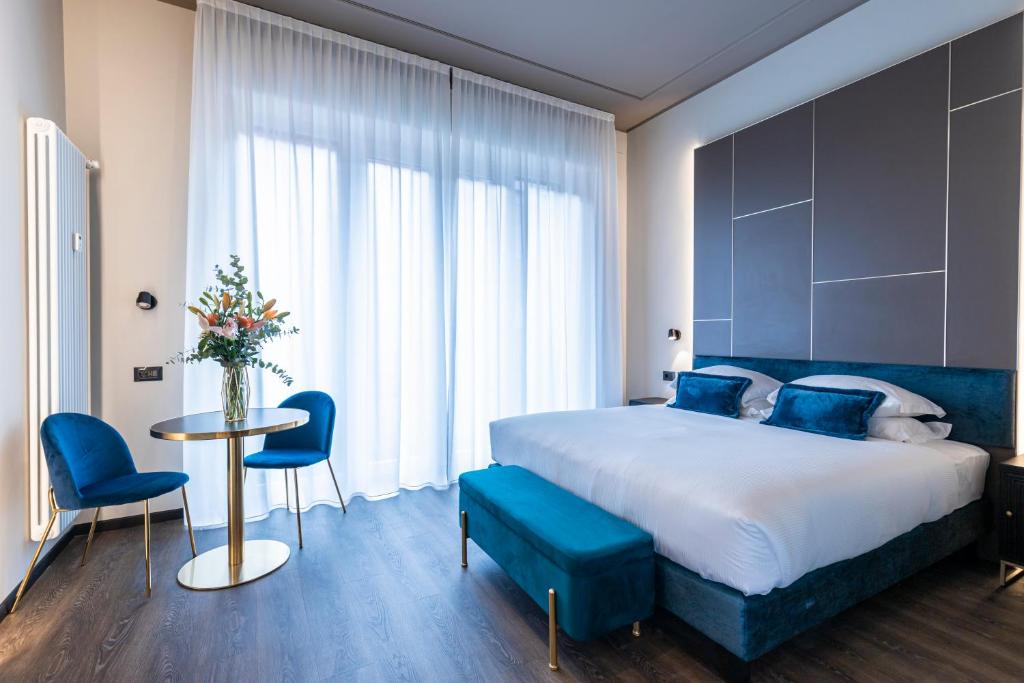 Postel nebo postele na pokoji v ubytování AH - Collezione Brera