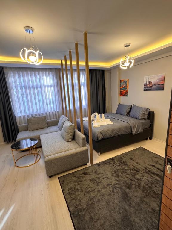 En eller flere senge i et værelse på The Old Bazaar Suites Apartment