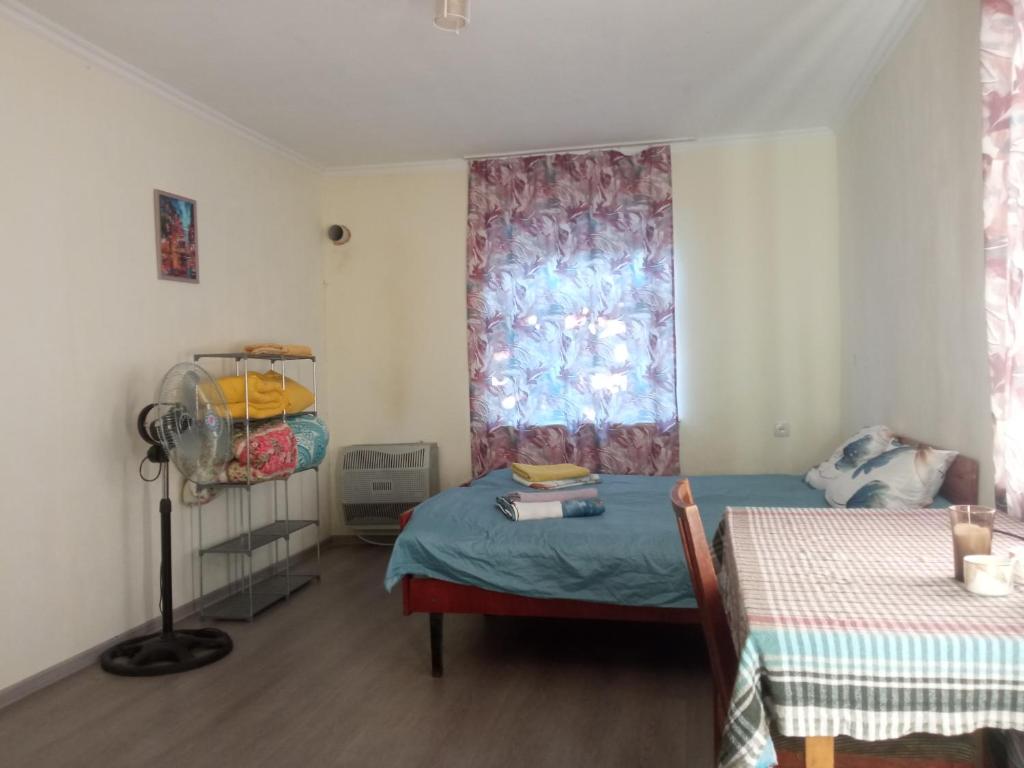Ένα ή περισσότερα κρεβάτια σε δωμάτιο στο Guest house with two rooms
